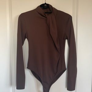 Zara- long sleeve brown bodysuit.with detail twist at top.